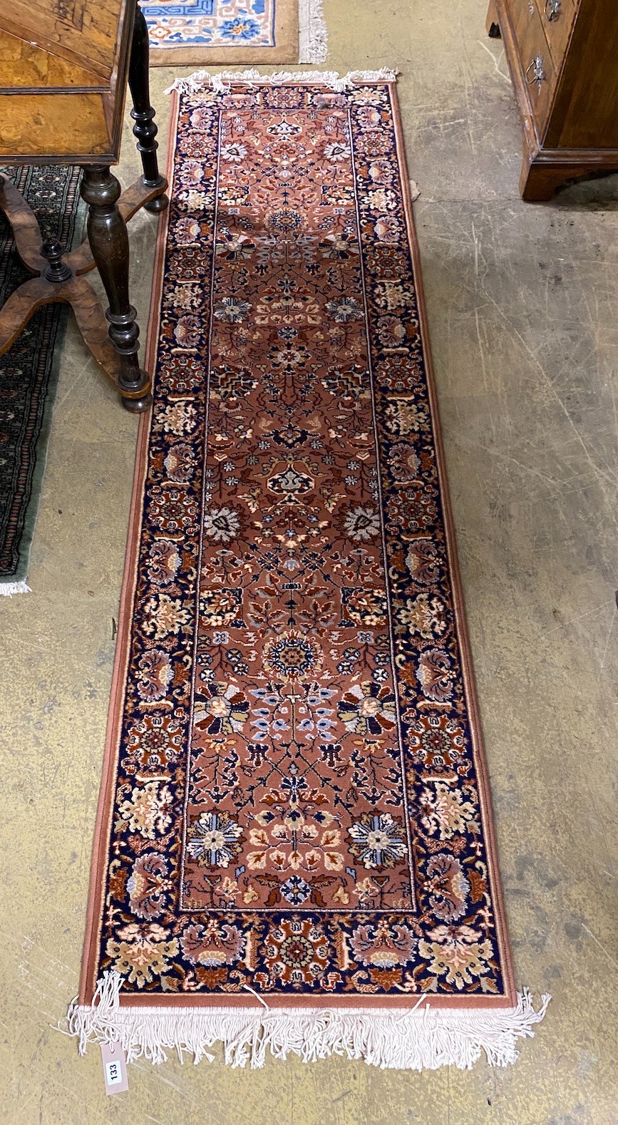 A North West Persian style peach ground runner, 270 x 71cm